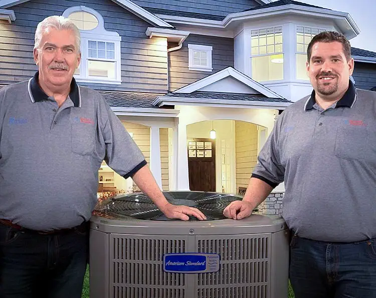 Russell & Ryon Allen of A/C Service & Repairs LLC, after an American Standard Air Conditioner installation.