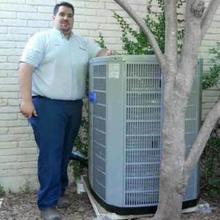 Ryon Allen of A/C Service & Repairs LLC, after an American Standard Air Conditioner installation.
